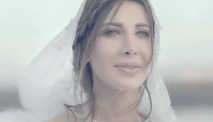 صورة متحركة عربية GIF: نانسي عجرم ابتسامة فرح الحب — نانسي عجرم، ابتسامة، فرح — للمشاركة على واتساب